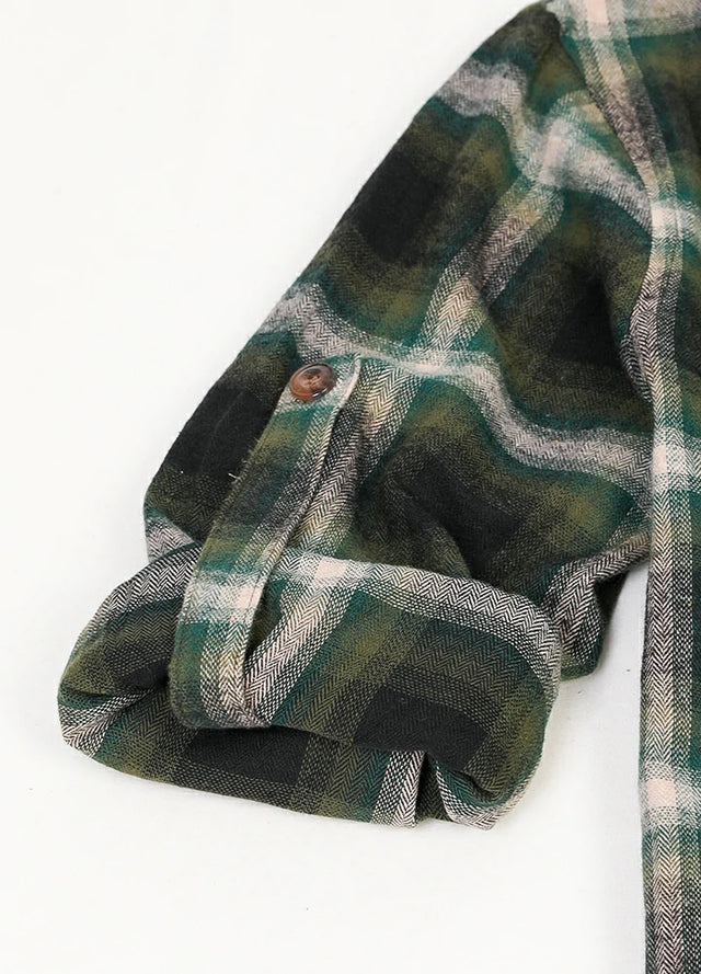 Zoomed-in of women's dark green soft warm plaid flannel shirt roll up cuffs