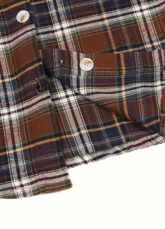 Zoomed-in view of the hem on a women‘s chocolate flannel shirt