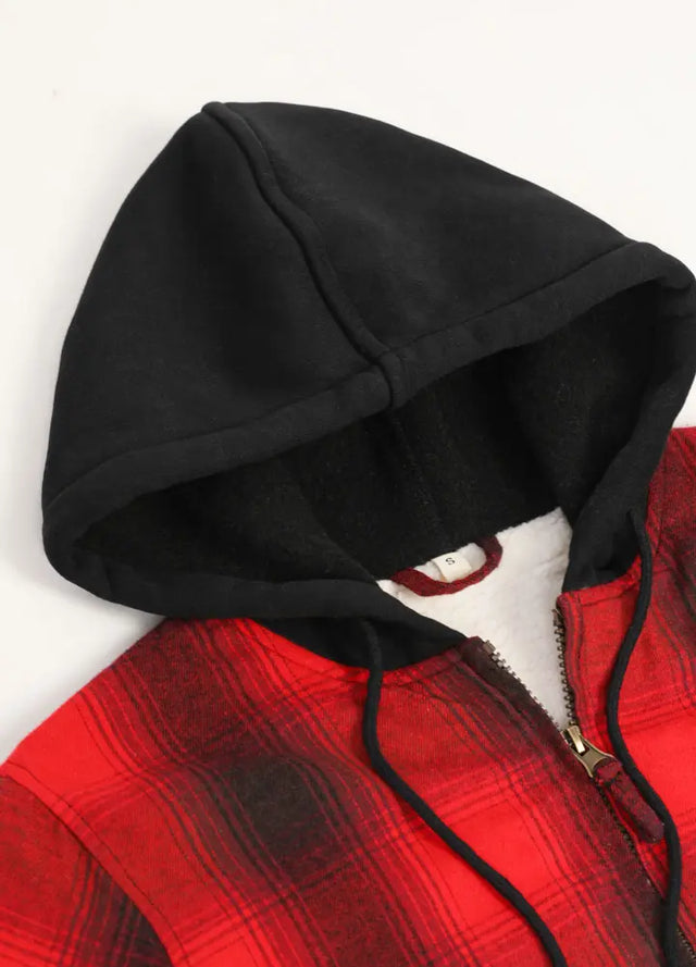 Zoomed-in view of the women's fleece hood on a red plaid flannel hooded