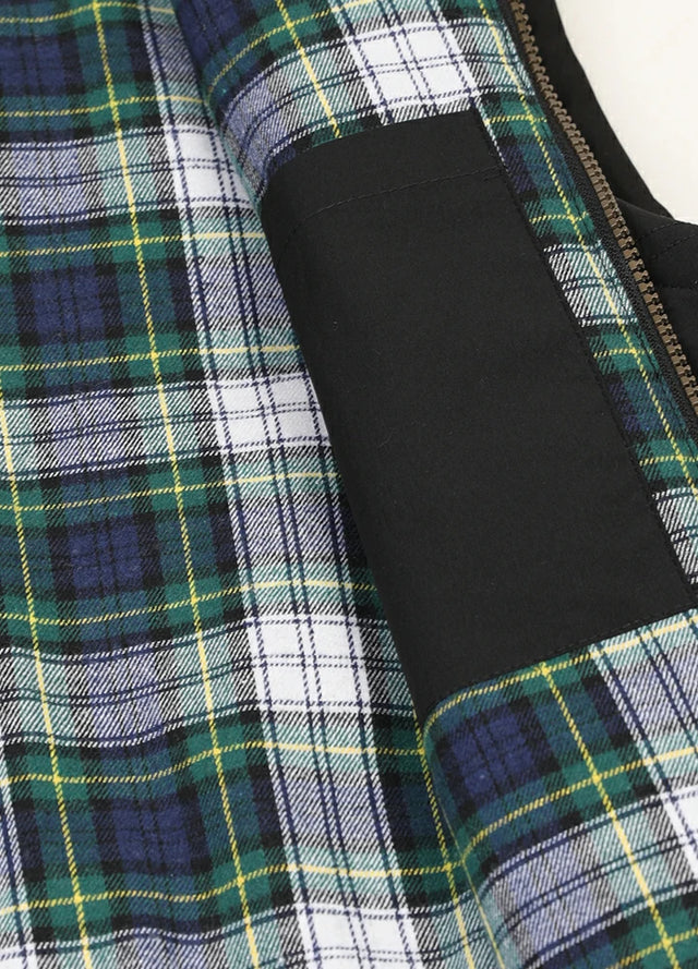 Zoomed-in view of womens black winter lightweight puffer vest inner pocket