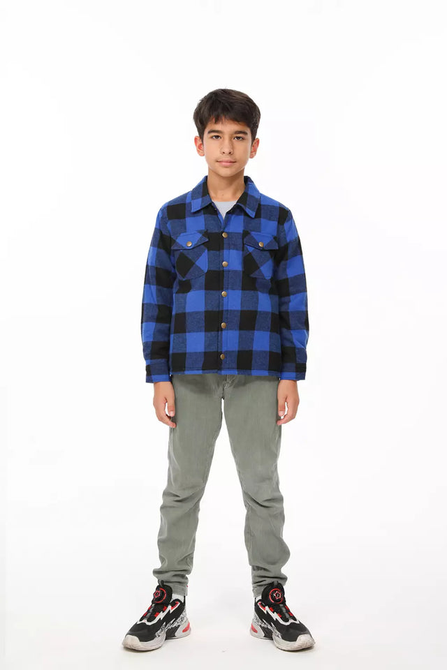 A boy in blue cotton flannel shacket