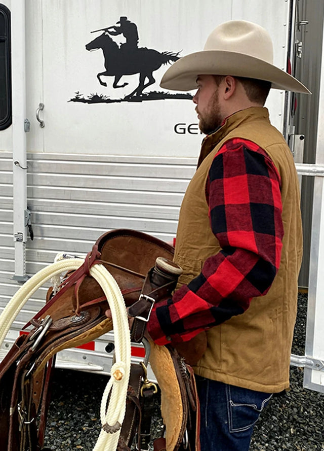 A busy cowboy in a dark coffee men's reversible fleece lined vest