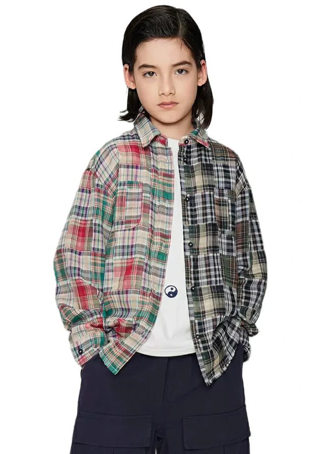Boy in multicolor and black-and-white patchwork classic patchwork flannel plaid shirt