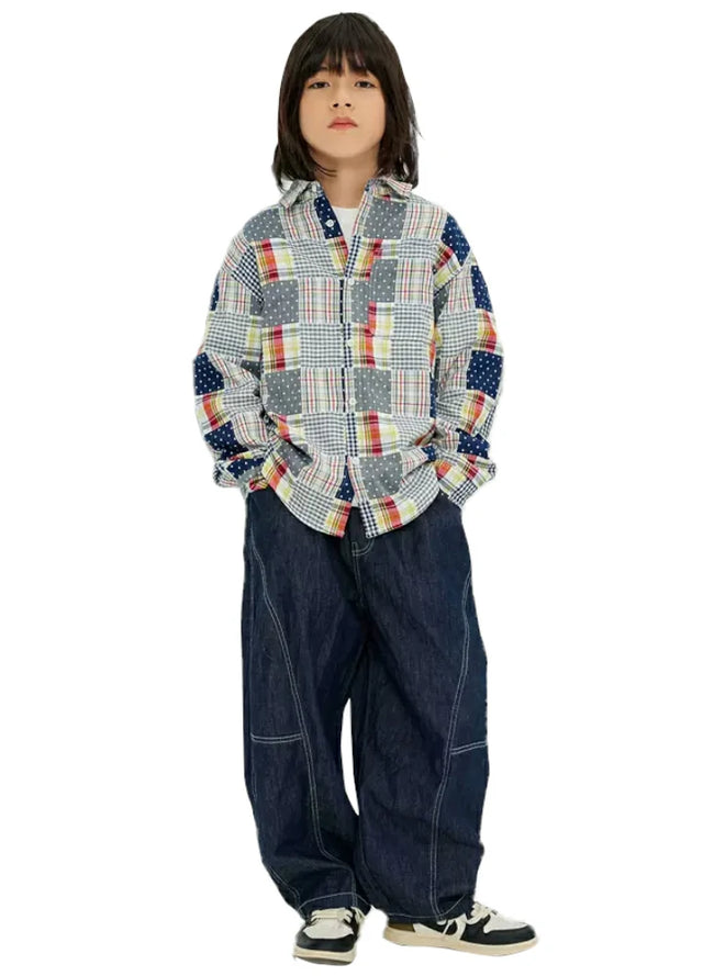 A handsome boy in country meadow Color-block patchwork flannel shirt