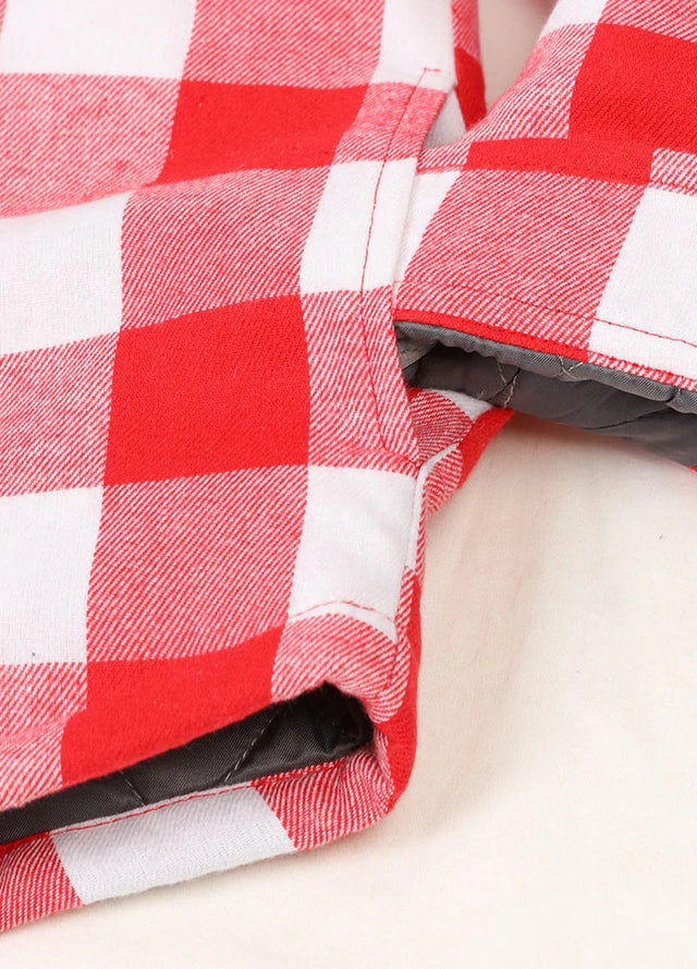 Close-up of kids red white flannel shirt jacket pocket with button