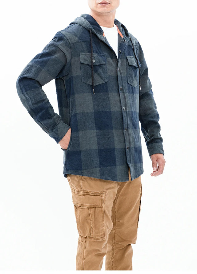 Man in a ink green men's warm heavyweight flannel hoodie