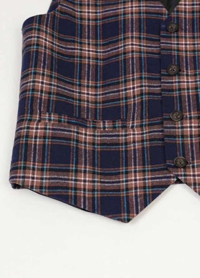 Closed-up of the hem on the kids navy browndressy suit vest
