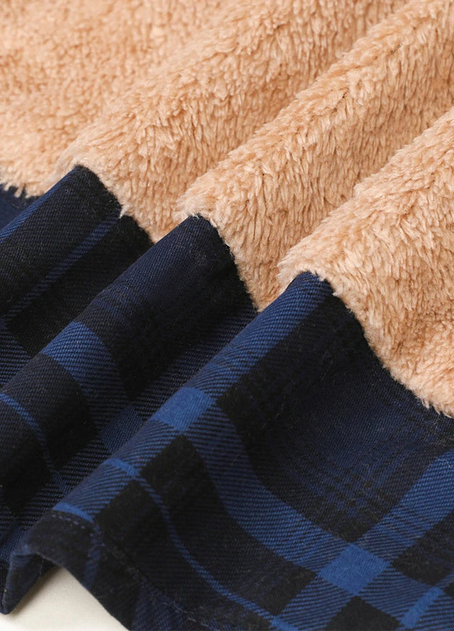 Detailed view of the lining of indigo men's snap button cotton flannel jacket with hood