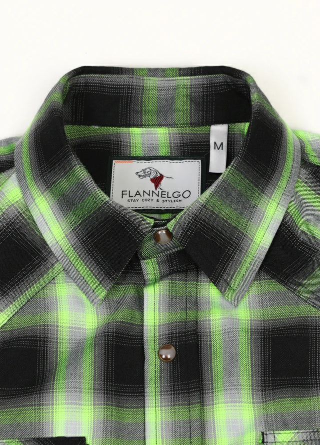 Close-up of the lapel of black green men's durable western snap pearl plaid vest