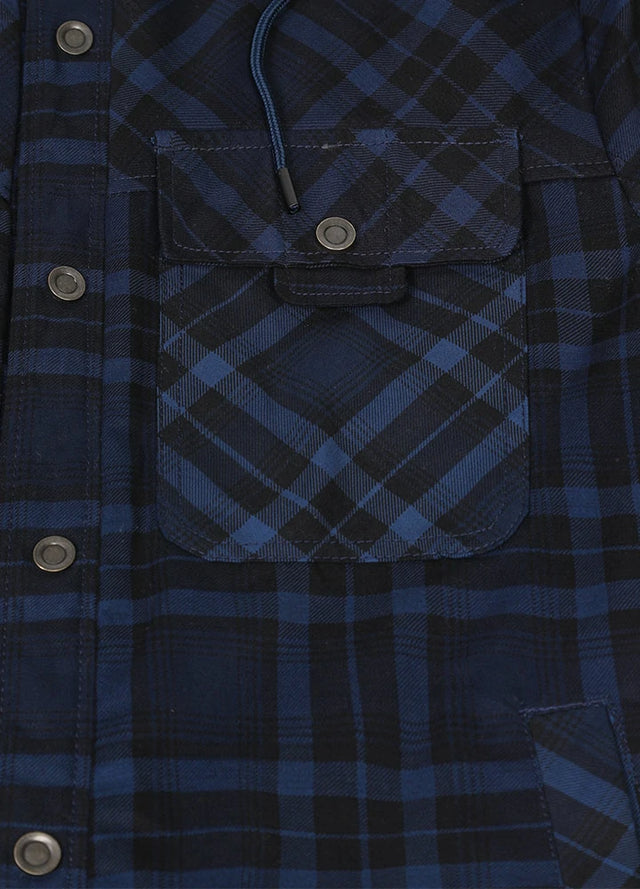 Close-up of the pocket of indigo men's cotton flannel shacket with hood