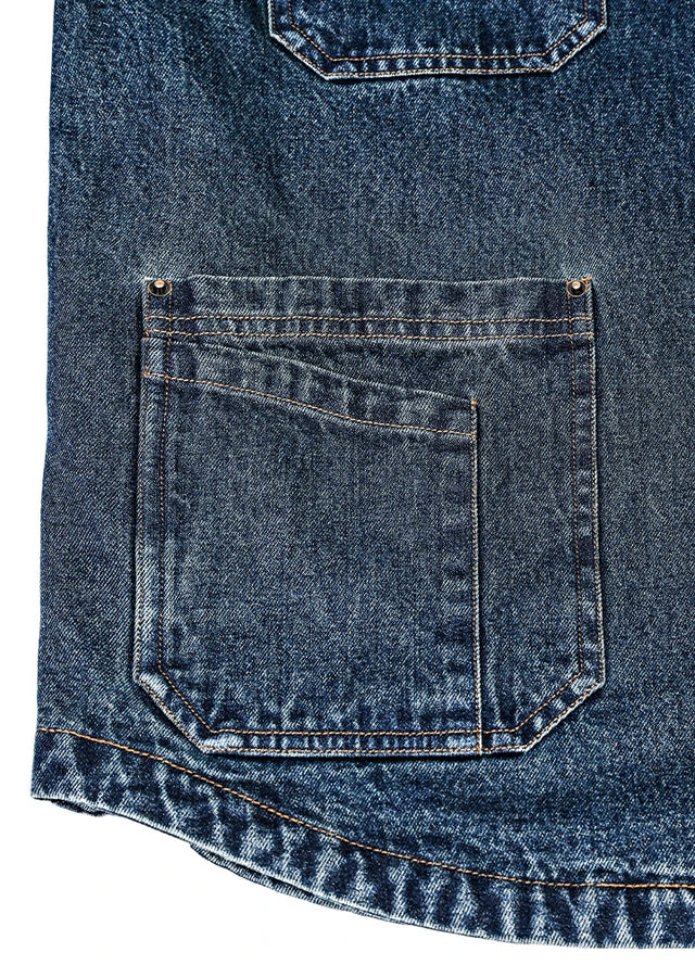 Close-up of the hand pocket of indigo men's winter denim flannel lining shirt jacket