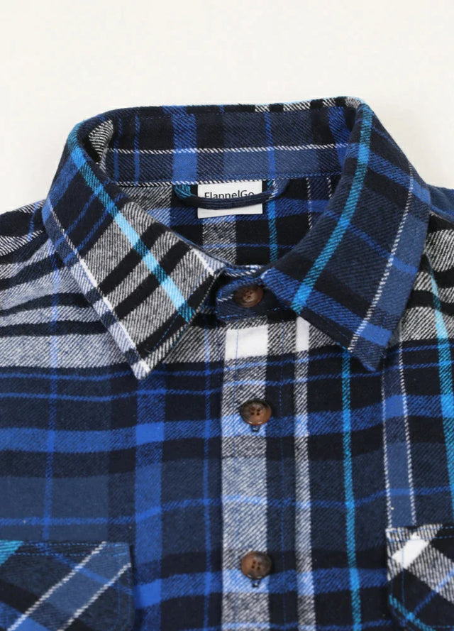 Close-up of the lapel of royal blue men's stalwart cotton plaid shirt