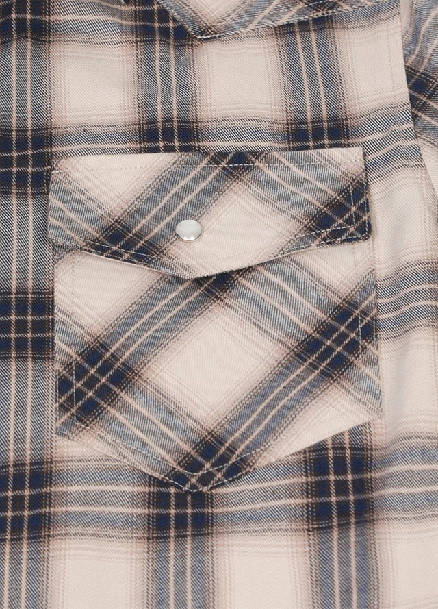 Close-up of the pocket of beige gray men's snap button long sleeve western shirt