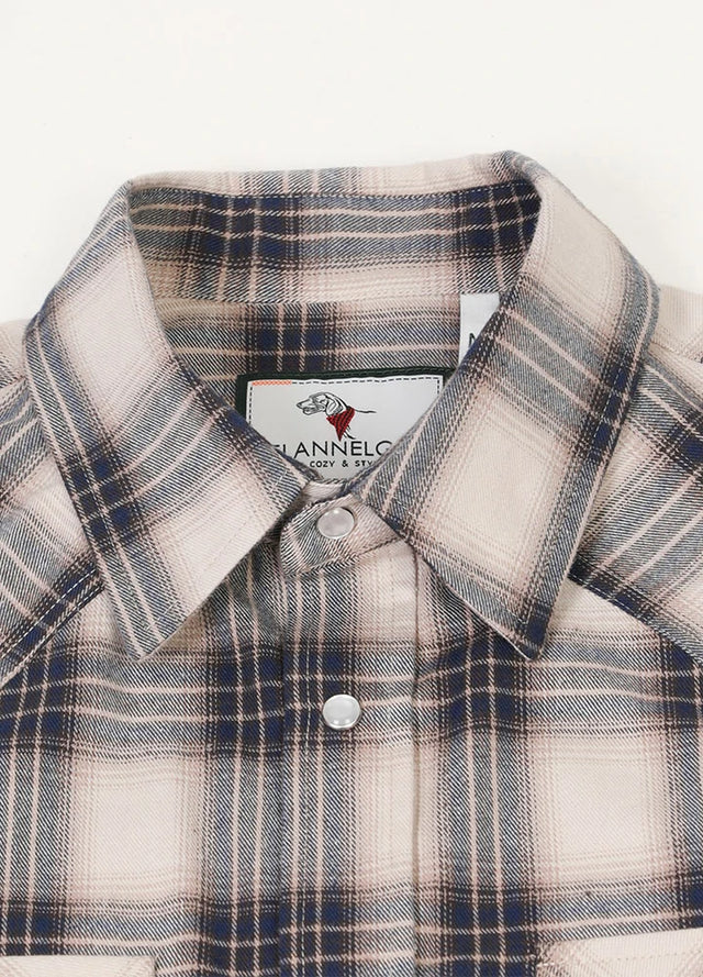 Close-up of the lapel of beige gray men's warm long sleeve western shirt