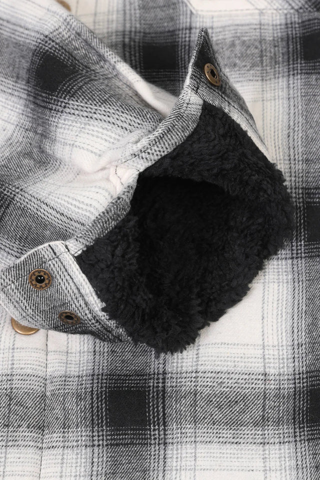 Detailed view of the cuff of midnight snowfall men's thick flannel cotton jakcet with sherpa lining