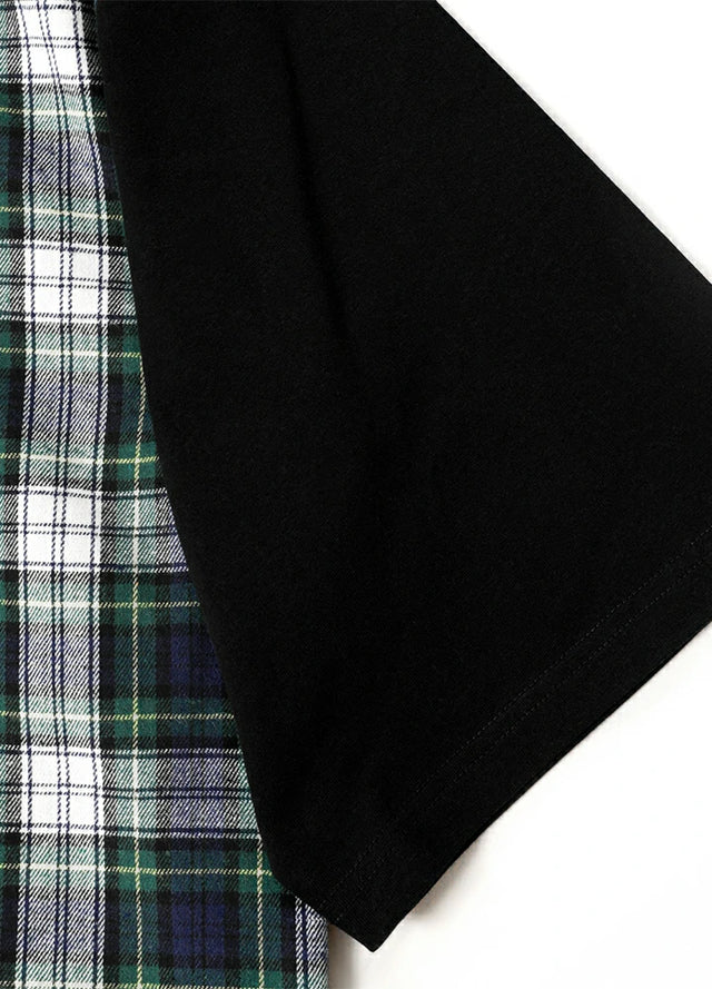 Detail view of the short cuff of the green blue men's plaid flannel shirt
