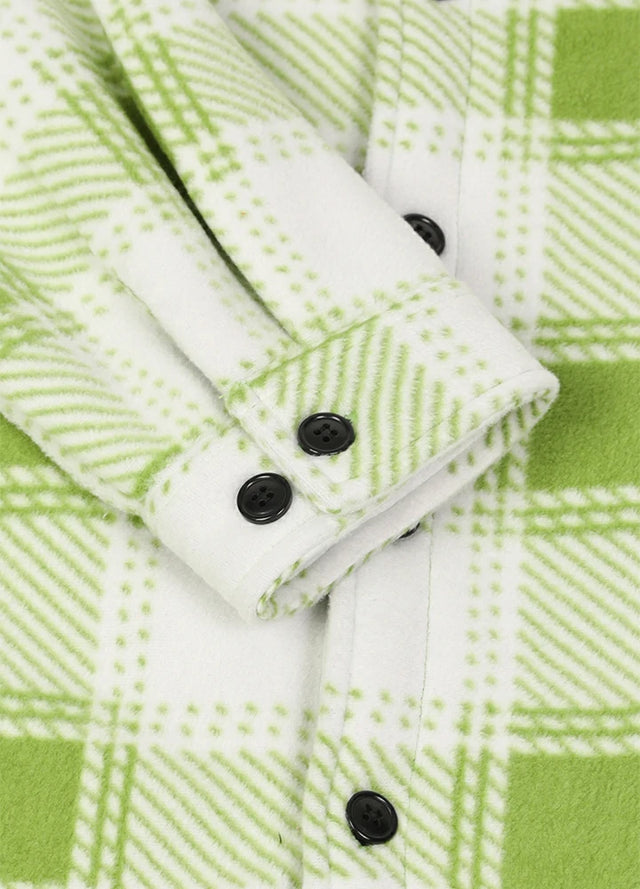 Close up of the cuff of the green white cozy men's plaid shirt jacket