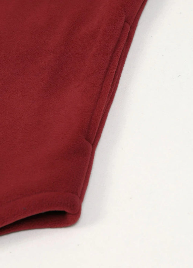 Close up of the seam pocket of the wine red men's cozy sherpa lined fleece shacket