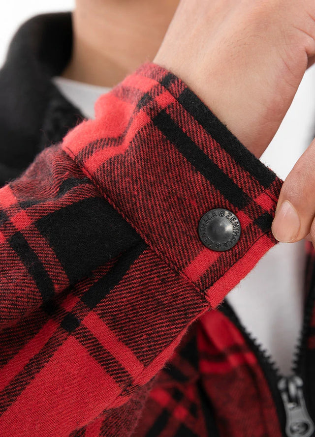 Close-up of a man in red black men's sherpa-lined flannel jacket with a hood showing his cuff
