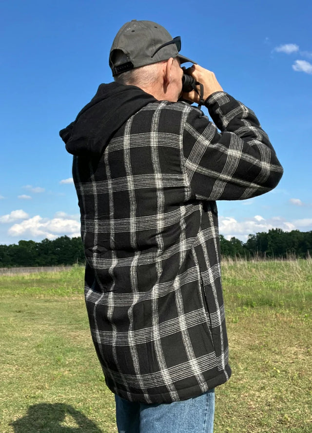 Back view of a man in a men's thicken plaid hooded flannel shirt jacket