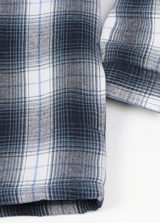 Close-up of the hand pocket of navy white warm quilted lined flannel hooded jacket for men