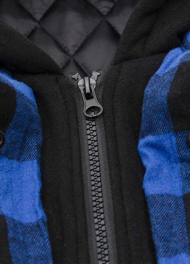 Close-up of the zipper of blue buffalo plaid men's plaid hooded flannel shirt jacket