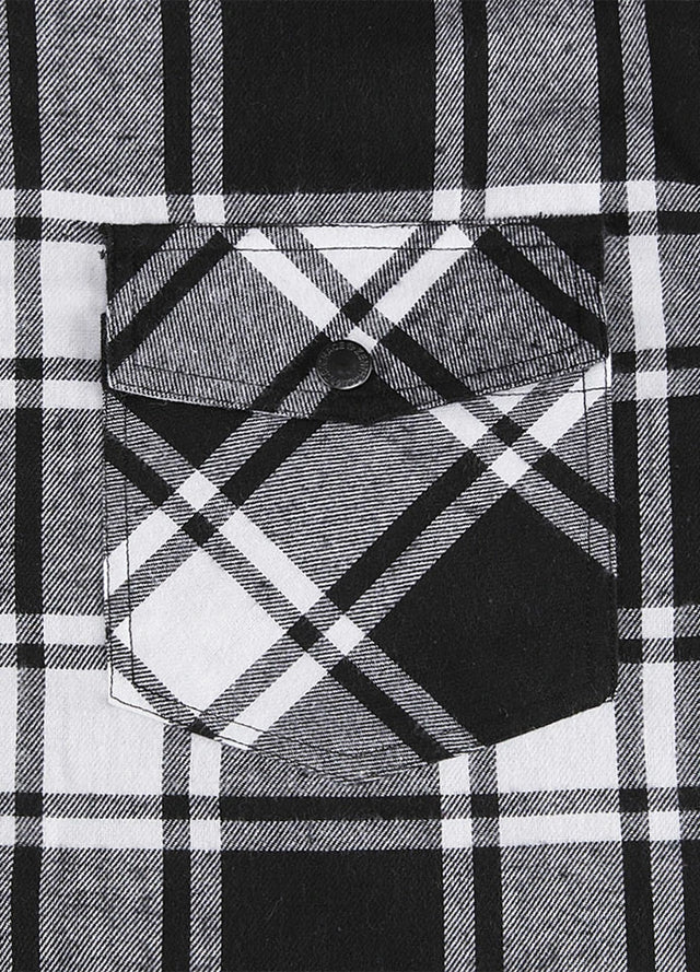 Close-up of the pocket of a black and white men's warm flannel hooded jacket