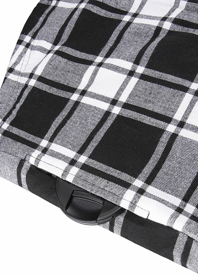 Close-up of the seam pocket of black and white men's warm flannel hooded jacket