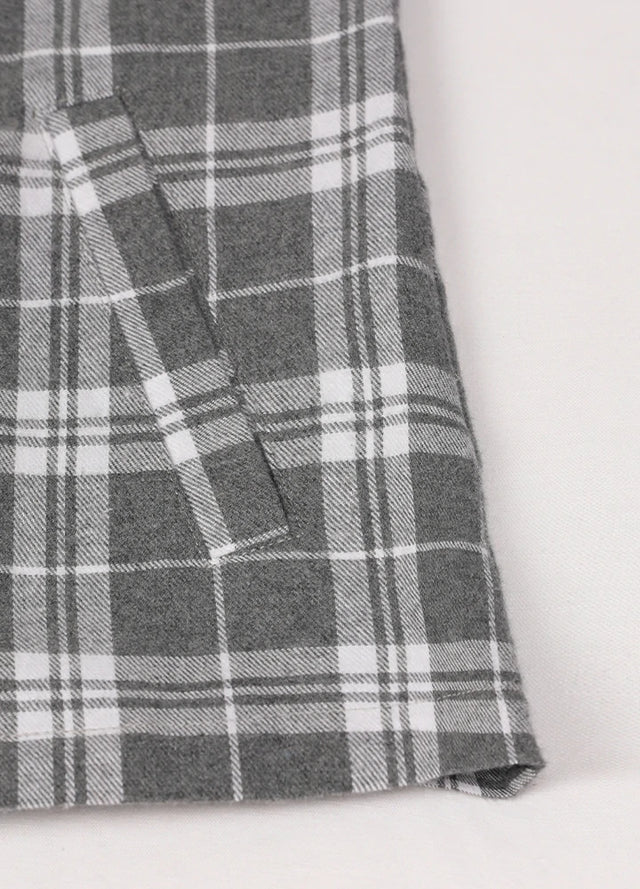 Close-up of the hand pocket on a women's full-zip gray white flannel hoodie