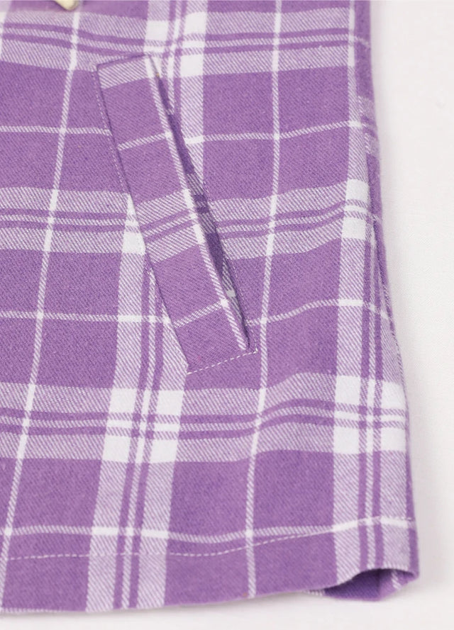 Close-up of the hand pocket on a women's full-zip purple white flannel hoodie