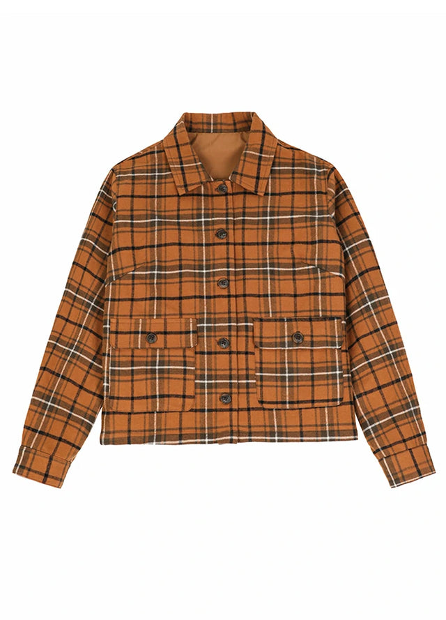 Front view of a women's orange plaid warm flannel jacket