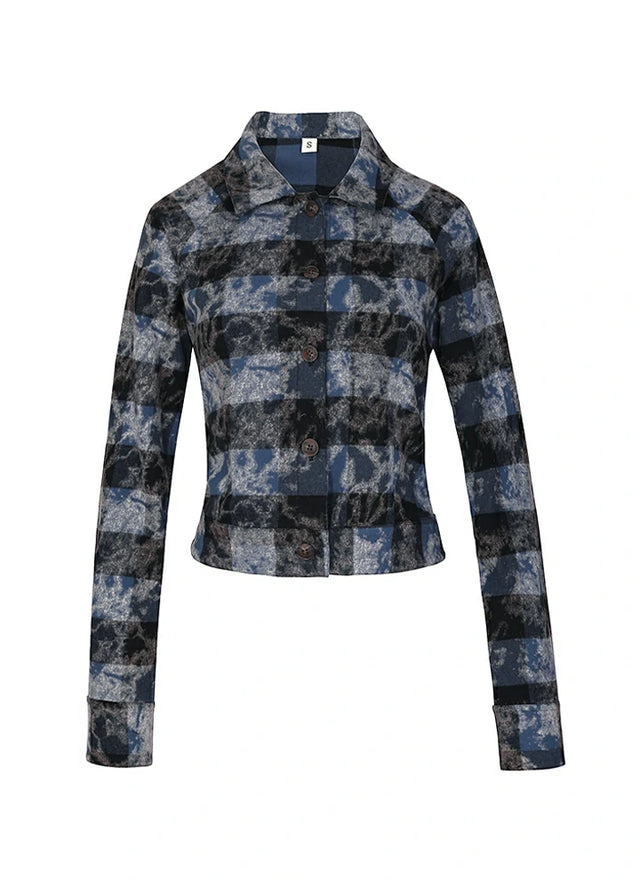 Front view of a women's cropped blue black washed plaid flannel shirt