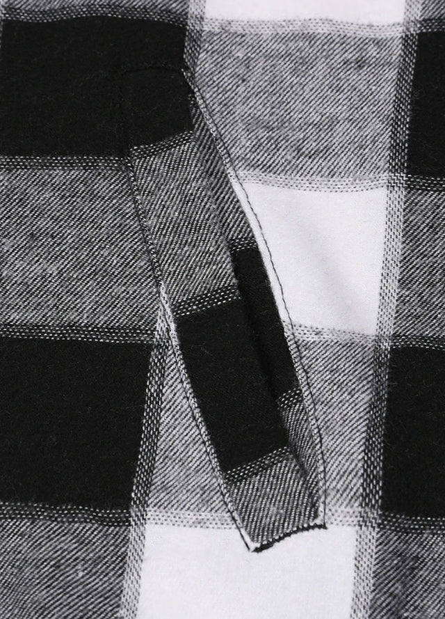 Close-up of womens sherpa-lined black gray flannel hooded hand pocket