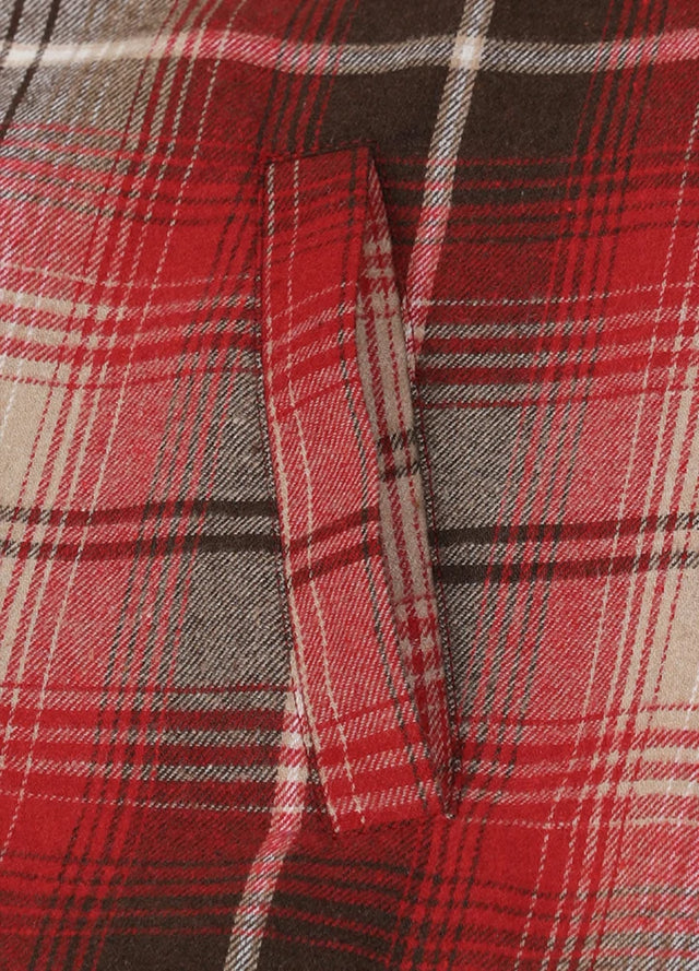Close-up of womens sherpa-lined red black flannel hooded hand pocket