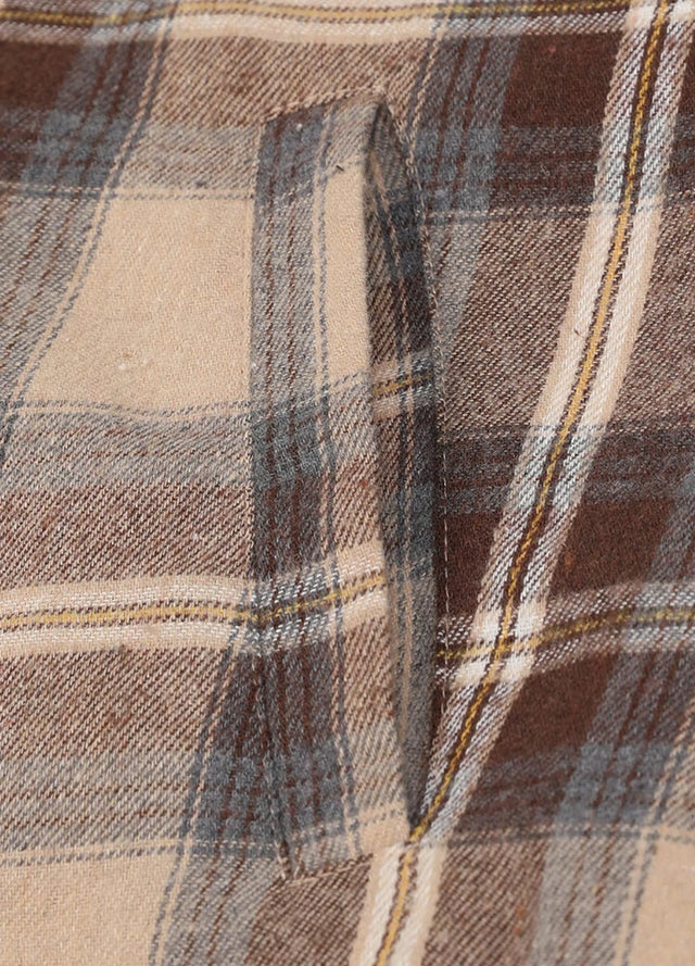 Close-up of womens sherpa-lined khaki brown flannel hooded hand pocket