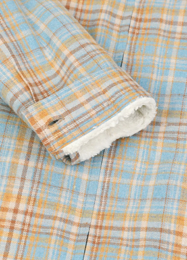 Detailed view of womens blue yellow sherpa lined flannel hooded jacket cuffs