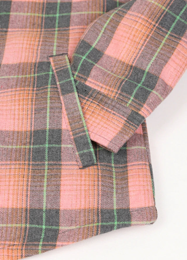 Close-up of womens sherpa-lined pink flannel hooded hand pocket