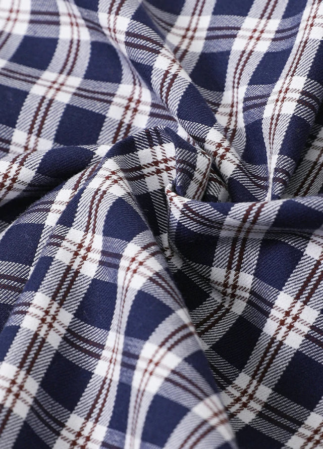Detailed view of the fabric of an indigo white plaid short sleeve shirt for men