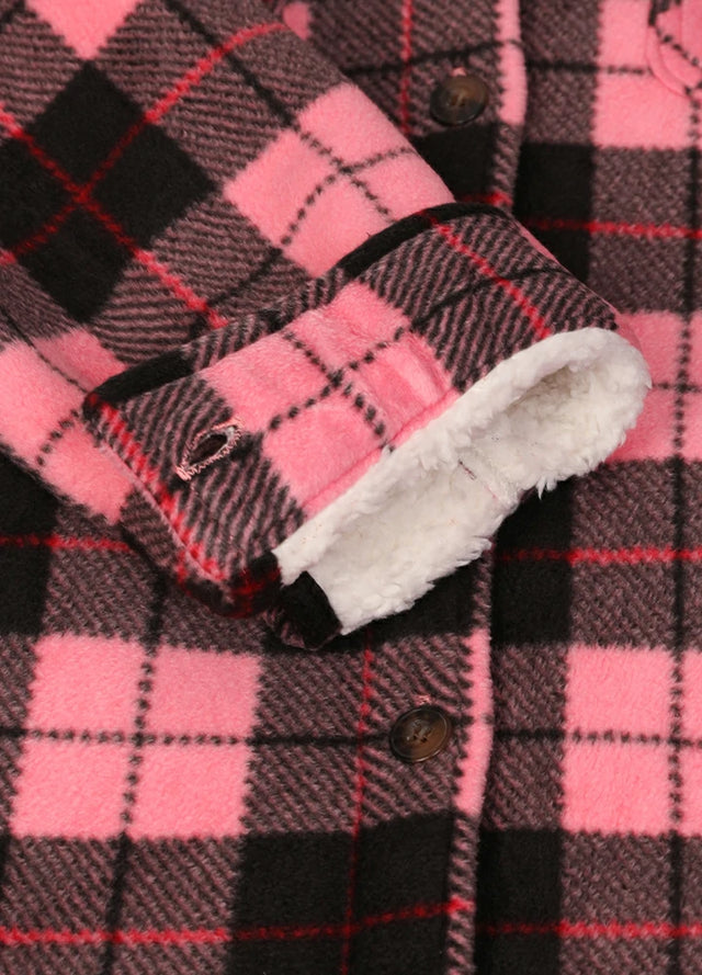 Detailed view of the cuffs on a womens black pink plaid fleece shirt jacket