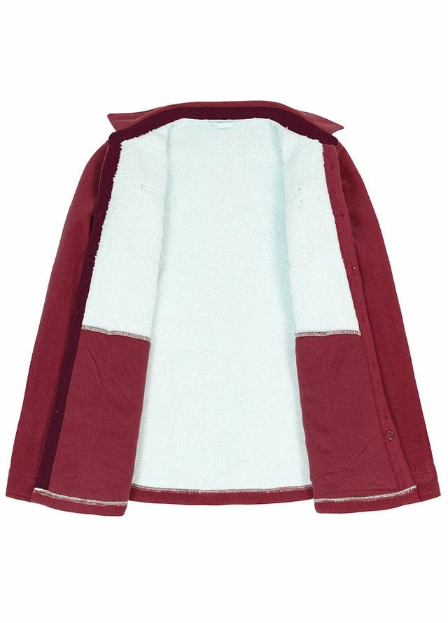 Detailed view of the sherpa-lined on a womens red fleece shirt jacket