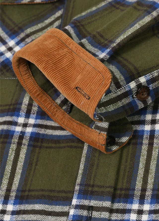Close-up of the cuff of army green men's cozy midweight flannel shirt
