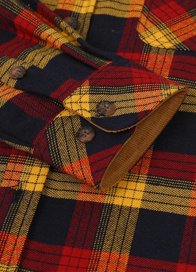 Close-up of the cuff of yellow red men's cozy midweight flannel shirt
