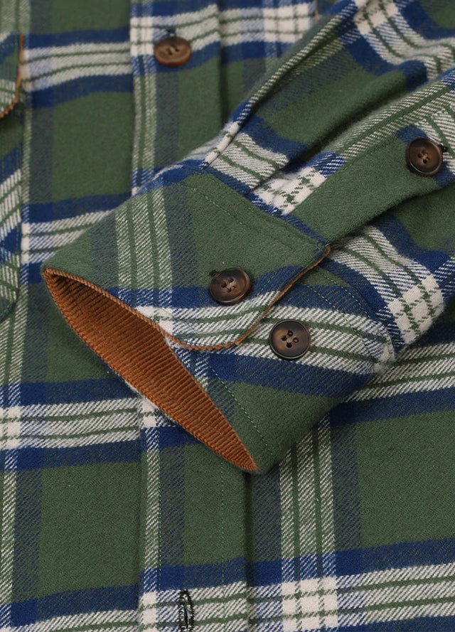 Close-up of the cuff of hunter green men's cozy midweight flannel shirt