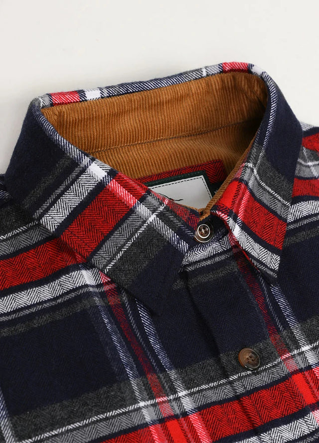 Close-up of the lapel of navy red men's timberline flannel shirt