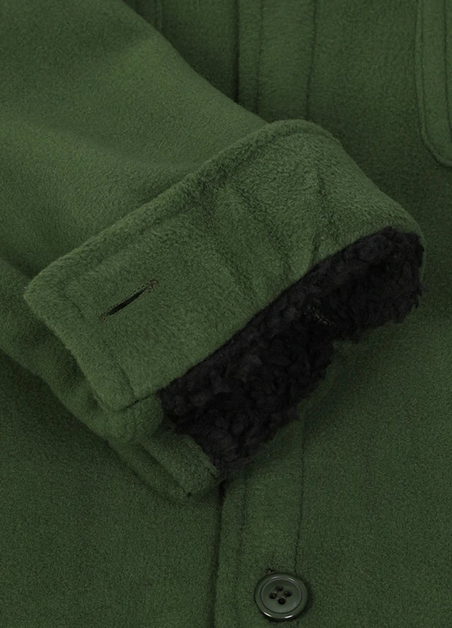 Close-up of the interior cuffs of kids
army green flannel jacket