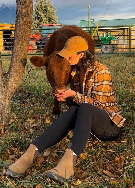 Women in a brown plaid soft midweight flannel shirt