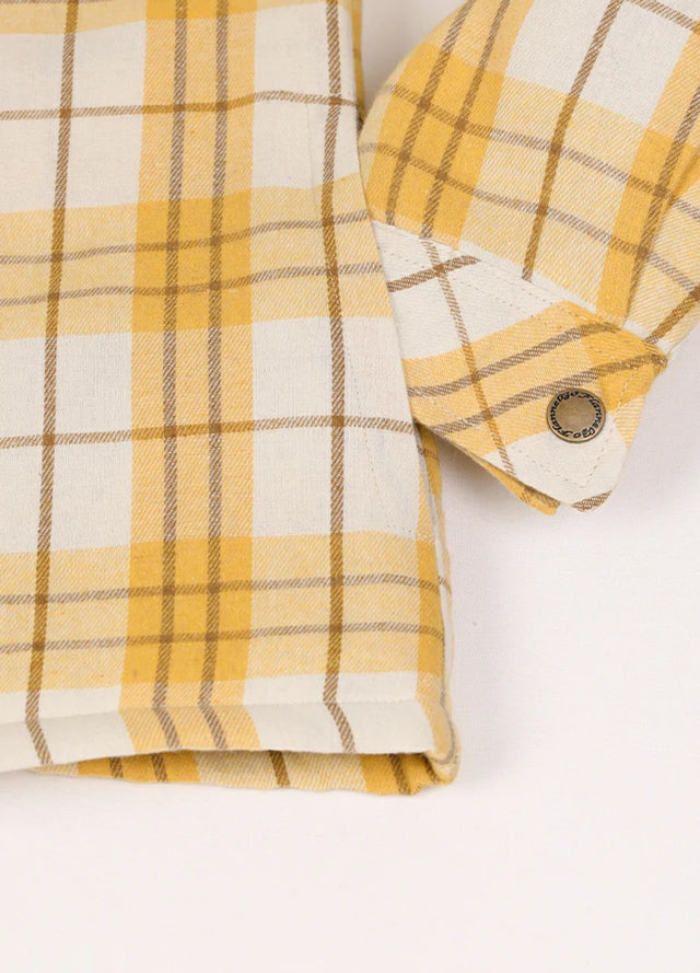 Zoomed-in view of womens quilted lined full zip yellow flannel hooded side pocket