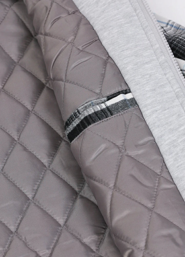 Zoomed-in view of womens full zip black white flannel hooded side pocket