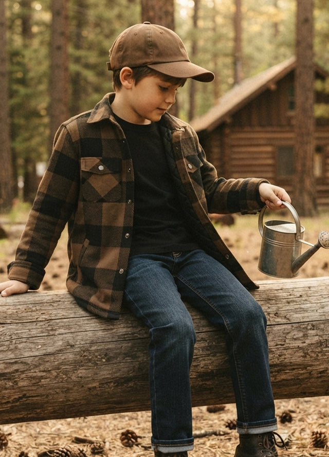 Side view of a young boy wearing a brown and black plaid flannel jacket--XR1177AG-S,XR1177AG-M,XR1177AG-L,XR1177AG-XL