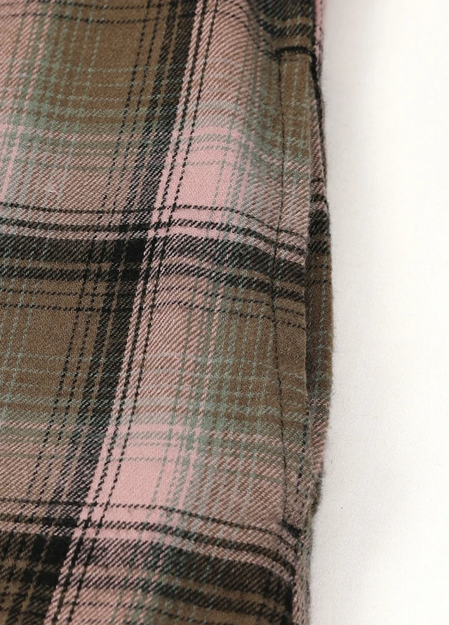 Detailed view of women's pink brown long sleeves flannel shacket side pocket